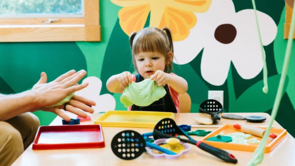 Girl playing with fFubber